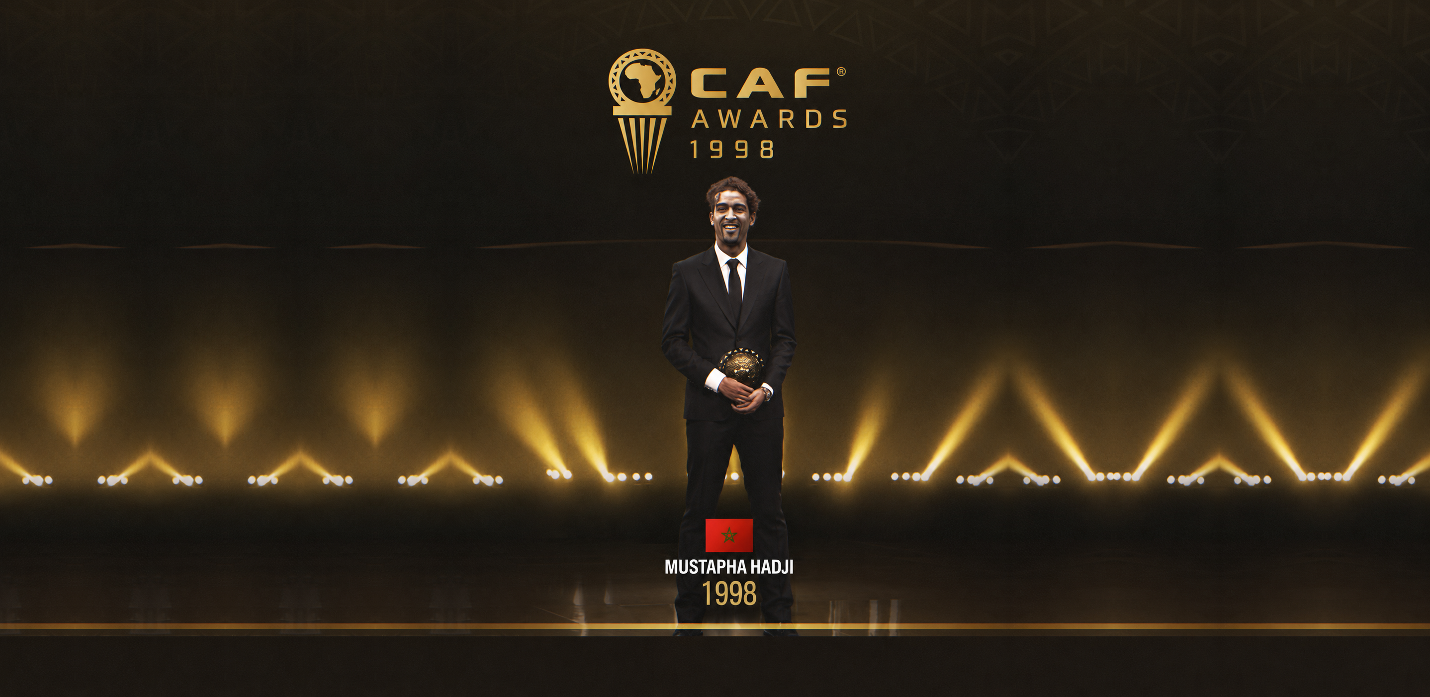 Mustapha Hadji with his CAF African Footballer of the Year award